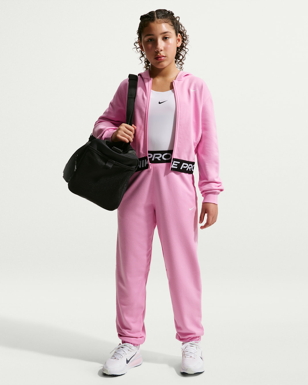 Nike Pro Fleece Older Kids' (Girls') Dri-FIT Joggers - Pink Rise/Pink Rise/Black/White
