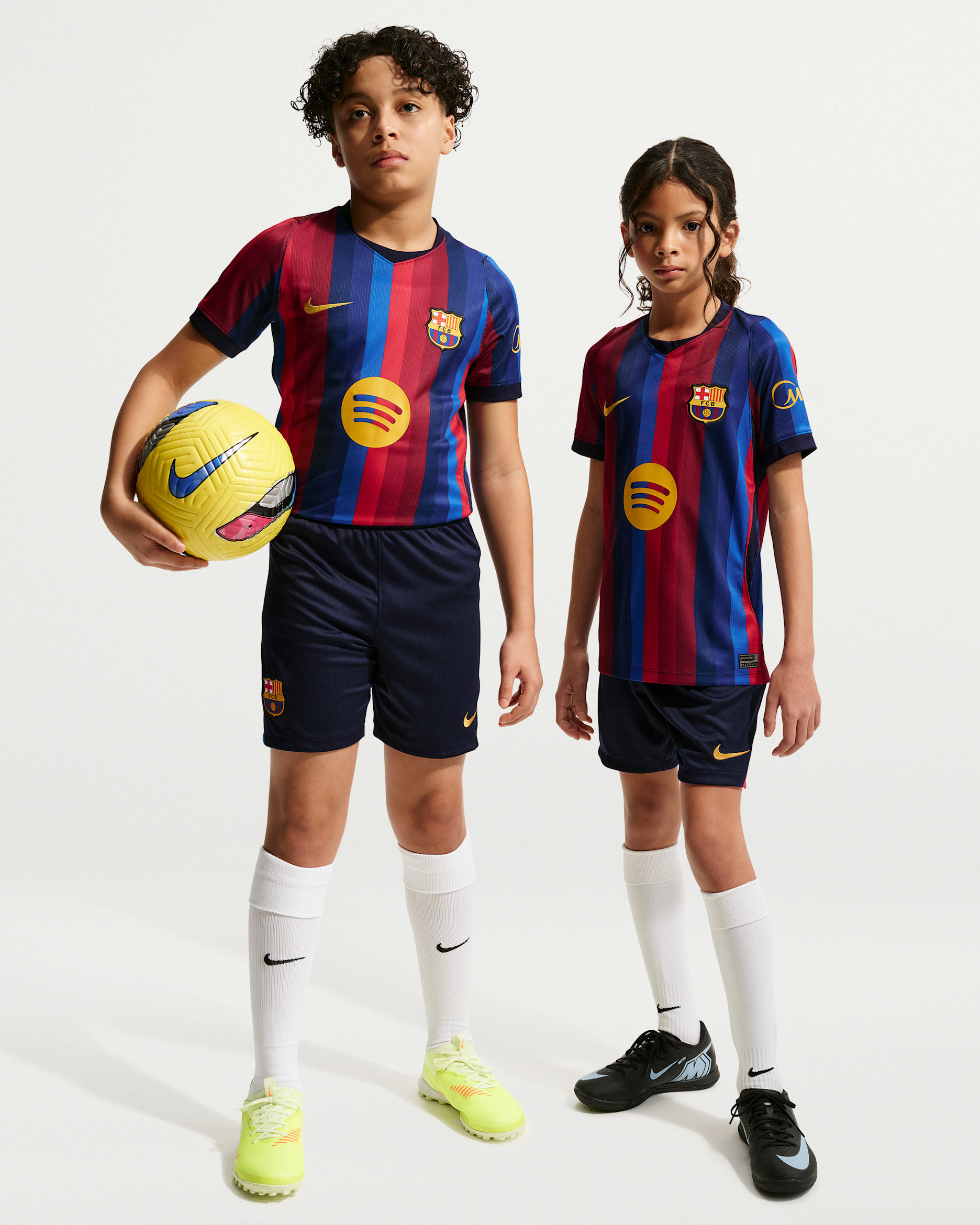 F.C. Barcelona 2026/27 Stadium Home Older Kids' Nike Dri-FIT Football Replica Shorts - Blackened Blue/Cardinal Red/Game Royal/Mineral Yellow