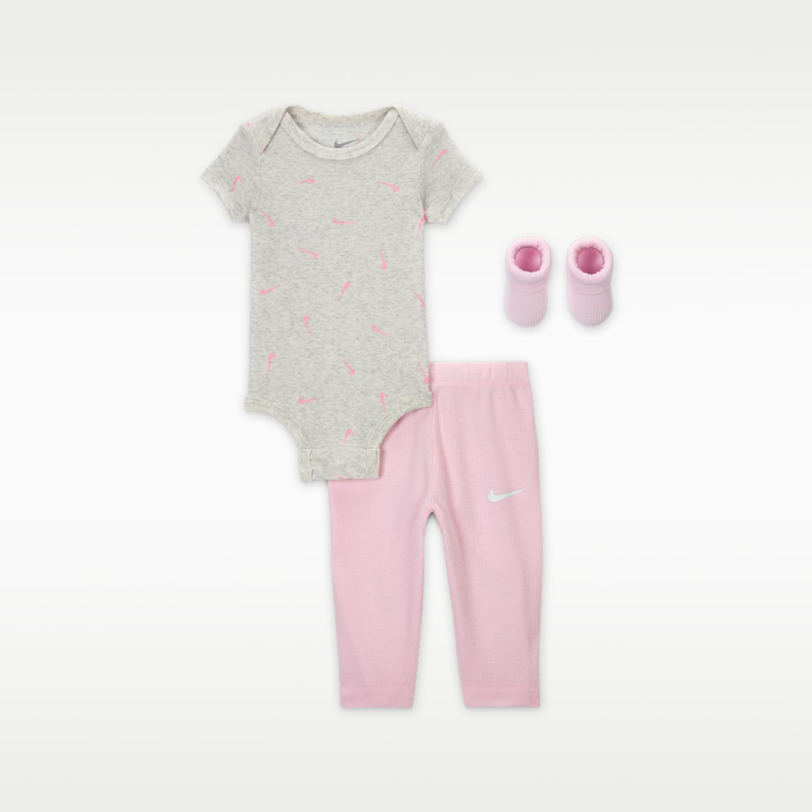 Nike Conjunto de tres piezas de body y pants tipo waffle para bebé (0 a 9 meses)