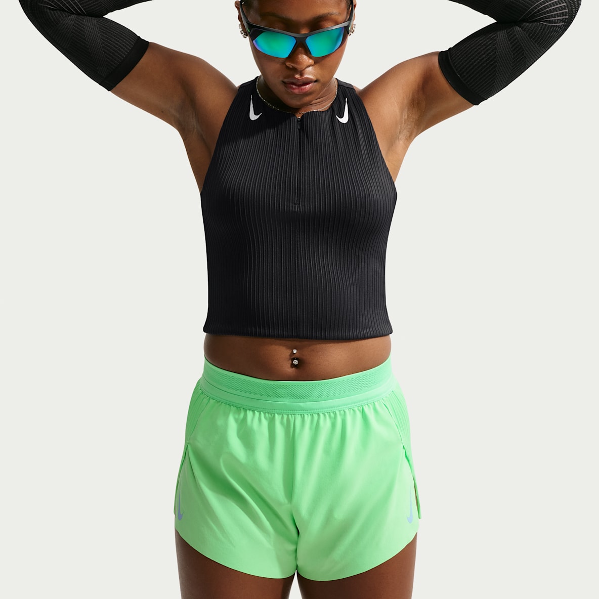 Nike AeroSwift Camiseta de tirantes de correr Dri-FIT ADV cropped con bolsillos para mujer
